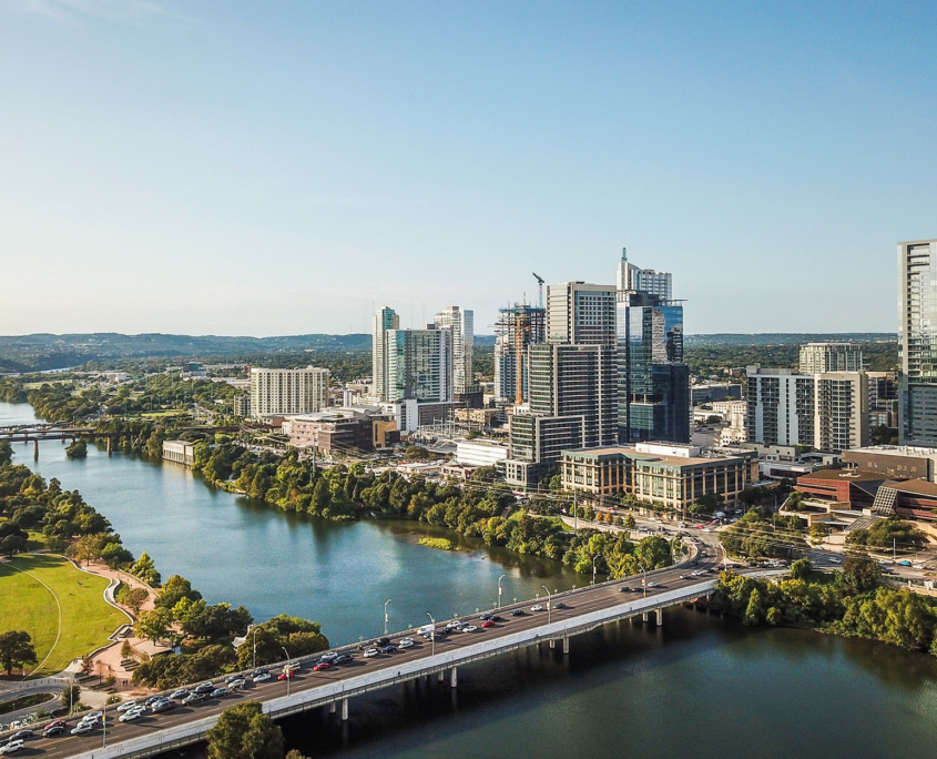 Aerial of Auston Texas from the Congress Avenue Bridge next to the Statesmans Bat Observation Center